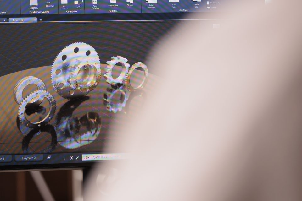 Female cad engineer manufacturing industrial product.